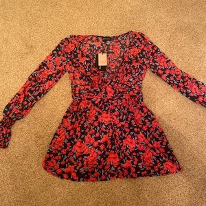 Pretty Little Thing long sleeve button up dress. Floral Print.